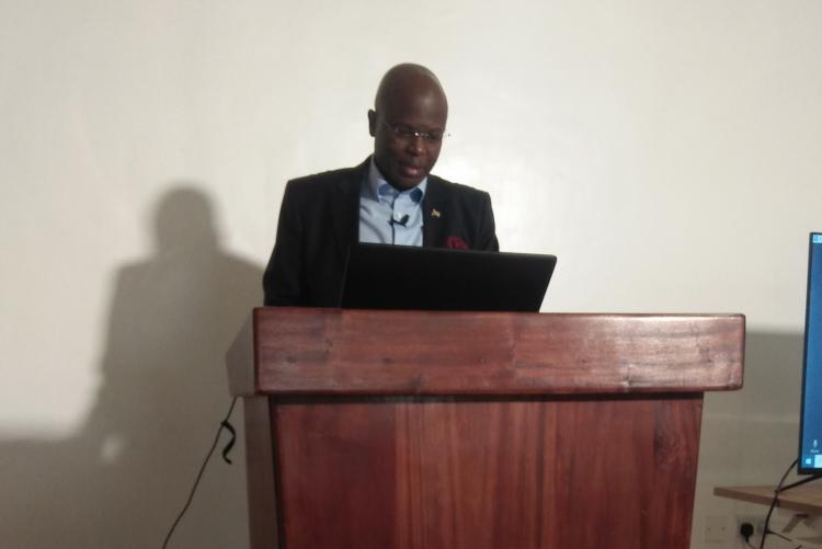 dr. oMBONGI PRESENTING HIS RESEARCH