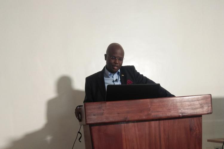 dr. oMBONGI PRESENTING HIS RESEARCH