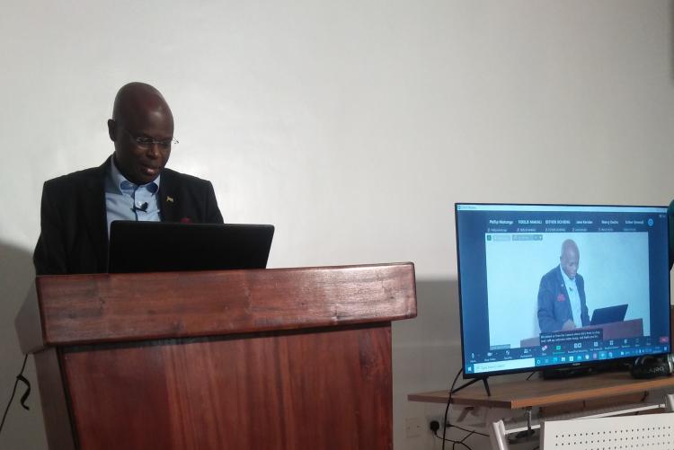 dr. oMBONGI PRESENTING HIS RESEARCH