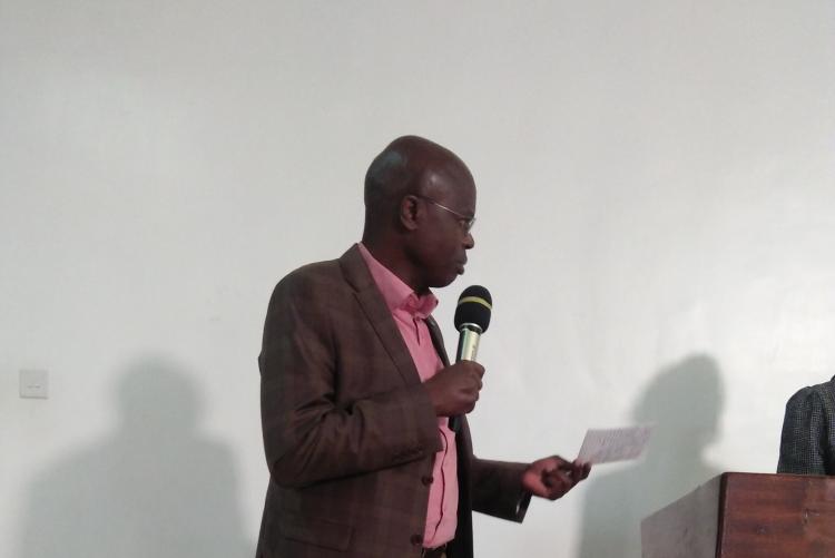 DR. OMBONGI MODERATING THE PRESENTATION